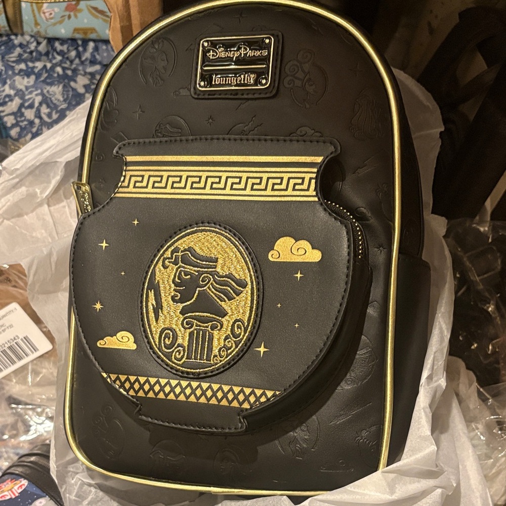 Rare —-disney parks Hercules loungefly